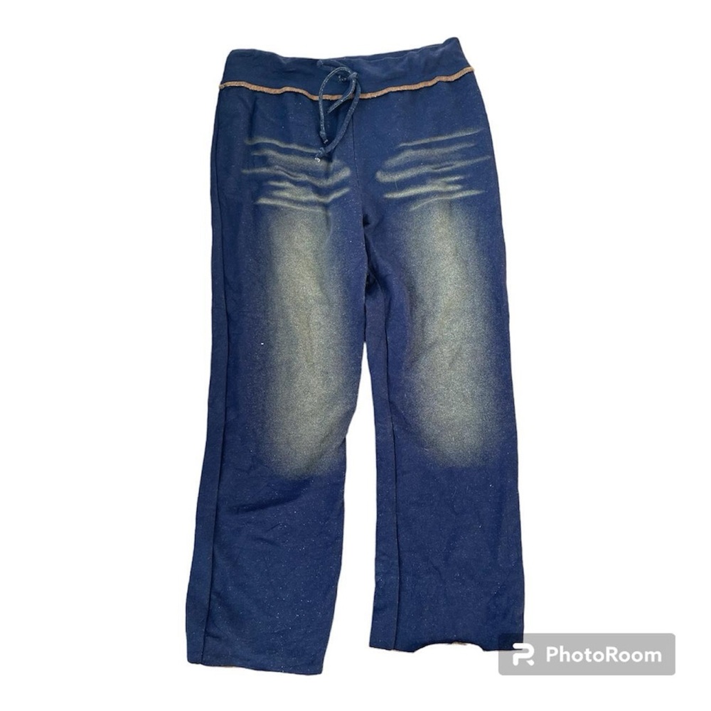 Vintage Y2K 00’s blue washed out tracksuit pants imitating jeans from Masq
